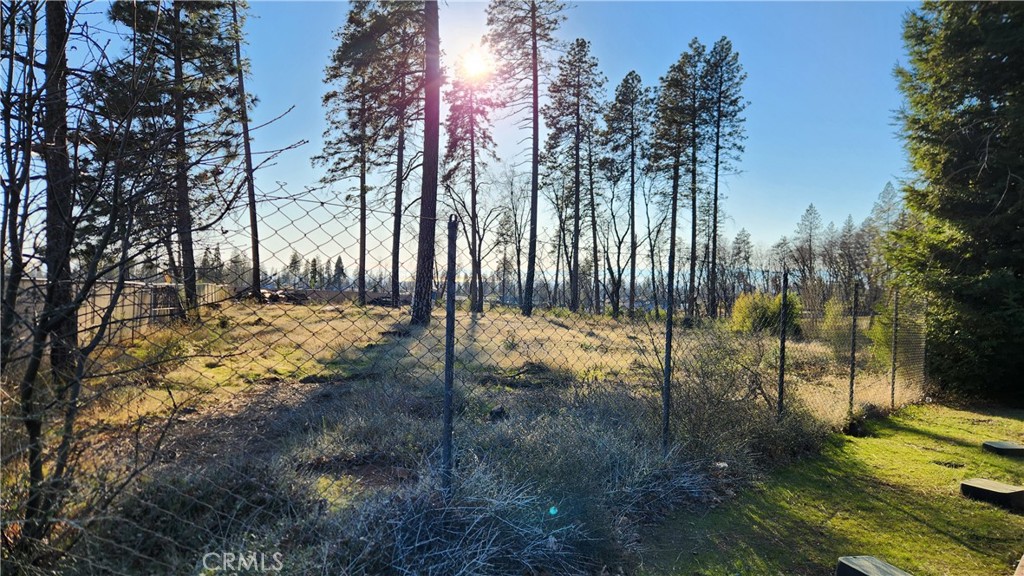 Prime Commercial development property, centrally located on the Skyway, in the heart of Paradise. The subject property is just over an acre in size, fully fenced, relatively flat, and zoned C2 which will accommodate a variety of commercial uses.