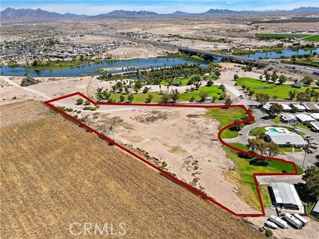 Exceptional Land with Water Rights in Blythe - Endless Potential!
Discover a rare opportunity in the heart of Blythe! This extensive piece of land offers generous space and valuable water rights, making it a true find in the desert landscape. Presently zoned as commercial, its versatility extends beyond imagination, as the city is open to a number of different rezoning options to match your vision and needs.
Key Features:
Over 5 acres of sprawling of flat, pristine land, providing a blank canvas for your endeavors.
Valuable water rights ensuring a consistent and reliable water supply for your projects.
Commercial zoning in place, showcasing its potential for business, trade, and development.
Potential for rezoning, allowing various alternative uses like residential, agricultural, recreational, or mixed-use development.
Convenient road access to the I-10 freeway, ensuring easy connectivity to major routes and amenities.
Breathtaking views of the surrounding natural beauty and stunning desert landscapes.
Investment Highlights:
A property primed for growth and expansion, offering a chance to benefit from the local economy.
Ideal for entrepreneurs, developers, and visionaries to bring their projects to life.
Perfect for agricultural pursuits, providing a setting for farming, ranching, or even vineyards.
Tranquil retreat for residential development, offering an escape from the city bustle.
This is a golden opportunity to secure your piece of Blythe's promising future. Whether you're looking to establish a bustling commercial hub, a tranquil residential community, or an agricultural sanctuary, this land with water rights sets the stage to turn your aspirations into reality.