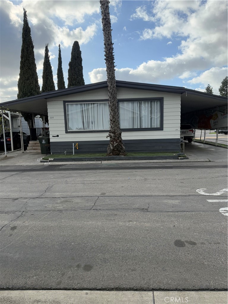 Great opportunity for first time buyers plenty of space with 4 Bedrooms 2 Bathrooms this Mobile home has new laminate floors and updated cabinets in the kitchen and master bathroom, it is situated in a corner. The Master bedroom has a huge vanity large dressing area, you will love it. The open floor give you plenty of room, inside laundry, A/C and Ceiling fans, 3 cars carport. This is a Family park, has a super location just accross is the Park Vista Park and Elementary School, The amenities in this park are Swimming Pool, Clubhouse and it is just 10 minutes from Disneland Park, close to Honda Center and Angel Stadium. 5 minutess from from 3 large supermarkets and shopping centers. Close to 57, 91 Freeways.