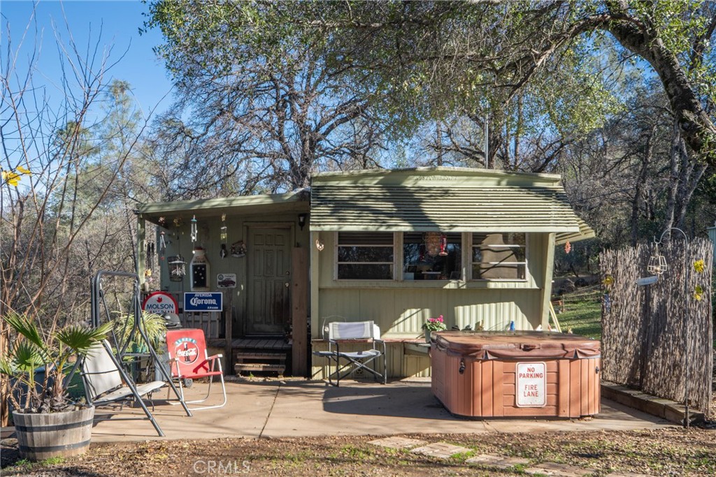 Escape the hustle and bustle at 635 Black Bart Rd! This serene 1.98 acre property boasts ample space for pets, farm animals, gardening, toy storage, and more. The older single-wide mobile home has a cozy living room as well as a family room with wood-burning stove, which is open to the kitchen that features recently-painted cabinets and a gas range. Down the hall you will find one bedroom, one bathroom, and additional square footage in the form of a large mud room/laundry room. Bring your tool belt, and with just a little TLC this cute home could easily be brought back to its full potential. The 2 acres are gently sloping and fully fenced with cross-fencing for animals already in place for you, too! Embrace the serenity of countryside living while enjoying the convenience of being just 20 minutes away from shopping, dining, and other amenities. Properties like this don’t come on the market too often. Don’t miss your chance to make this peaceful retreat yours!