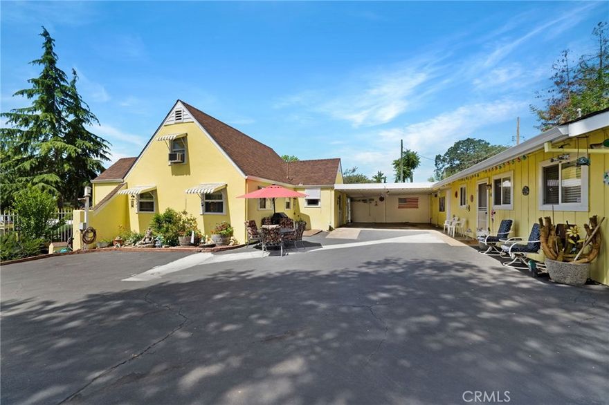 Well maintained Story Book Tudor home located in the heart of Nice.  Pictures to not do it justice for this 2 bedroom plus loft home. The property offers more!  A separate guest/inlaw quarters with a bathroom and the unit is prepared for a small kitchen. It is pre-wired with 220 for electric stove, drain for sink, plumbing in the wall for water source and electrical outlets in a sperate room.  A 30 gallon water heater, window a/c, wall heaters, ceiling fan, dual pane windows and recessed lighting are all included in the guest unit.  DYI your way to an additional income from the separte unit.

Main home is apprx. 1398 sq. ft. and guest house is apprx. 399 sq. ft. 

The main home living and dining room are adorn with crafted wood paneling, wood acrhes and ceiling.  Thoughtful and useful amenities include fireplace insert in living area Milguard dual pane windows, ceiling fans, raised alder wood kitchen cabinets. Central heating and air conditioning, separate laundry room, work shop and storage across the carport with a 7750 watt propane/gas generator.  The exterior has been recently repainted and the ashalt drive way was just slurry sealed. There is a small basement that houses the heating unit for easy access.  The property has an electric rod iron gate and ample parking for owner, guest, inlaws or tenant.  No HOA !