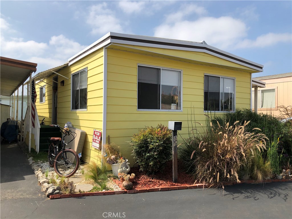 Location, Location, Location, Southbay Estates Park. Home is in good, move-in condition. 2 bedrooms with a lot of closet space. Washer & Dryer hook-ups inside unit. Copper plumbing. Newer laminate flooring. Enclosed private patio. Walking distance to shopping malls, markets, restaurants and public transportation. Approximately, 2 miles to beach. Pets allowed, submit for approval. Luxury senior park. Space fees only $960 per month. Perfect home for safe peaceful living with very friendly neighbors. Home is centrally located very close to clubhouse which includes kitchen, pool table, swimming pool, car wash and laundry facilities. Many planned activities at rec center for park owners. Park is well maintained with very good managers on site. Home includes double covered tandem parking and large covered storage area. Very affordable for families who want to have elderly loved ones close by. Don't miss, priced to sell quickly!!