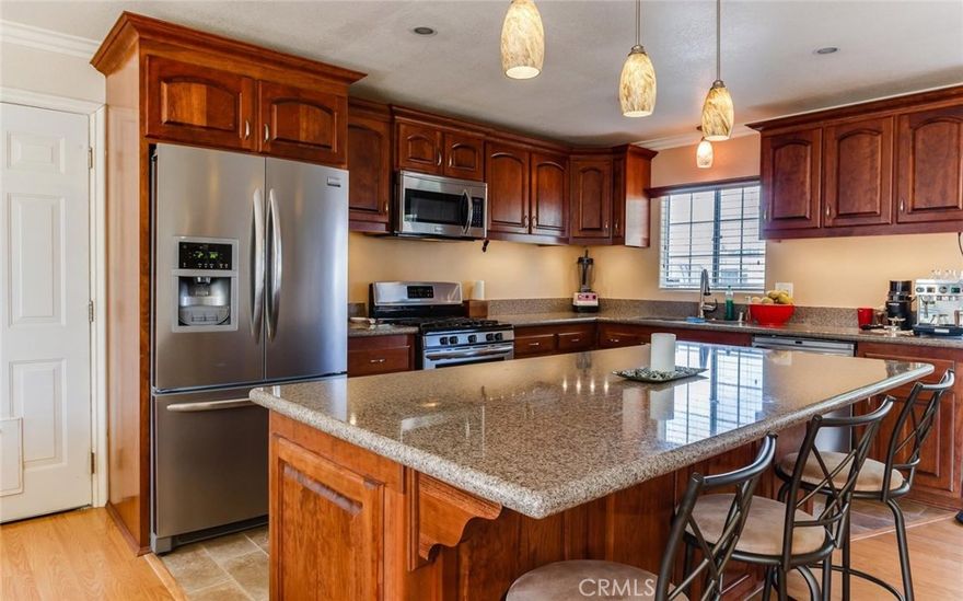 Beautifully remodeled Gardena home! Great open kitchen with an island, equipped with custom cabinets with soft close, and quartz counter tops throughout. New copper plumbing throughout house, just 3 years old! Laminate wood floors and newer windows recently installed. The master bedroom has a fantastic walk in closet, with a master bath equipped with a new bathtub, Quartz countertops, custom cabinets and medicine cabinet.  In addition, all bathrooms have been upgraded with new tile and flooring. See it now before it goes!