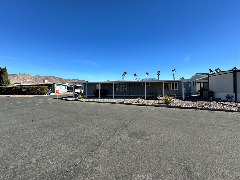 Rent-Controlled Community! Blue Fountain Park, currently a 55+ community, This affordable and beautifully updated 1-bedroom, 1-bath home features new carpet, an upgraded kitchen with new cabinets, a modern walk-in shower, dual-pane windows. Enjoy resort-style amenities like a clubhouse, pool, spa, and picnic area—all in a vibrant, rent-controlled setting near Aldi, Wal-Mart, as well as other shopping, and medical facilities and not far from Soboba Casino. Don’t miss this move-in ready gem, Soon to welcome all ages!—schedule your tour today!
