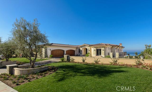 Fabulous New Mediterranean Style Oceanfront Home! This home features luxurious appointments and designer finishes with extensive use of natural stone, crown moldings and hardwood flooring throughout. As you enter through the front door you will be greeted by a grand foyer and double staircase. Offering 7,969SF of living space with 6 Bedrooms, including a large master retreat and 6.5 Baths. The floorplan includes a customized movie theatre room, formal living room, family room with wet bar, formal dining room music room, conservatory, kitchen with breakfast nook / pantry, and even an art room. Other features include a 4-car garage, elevator and multiple balconies. All of this set within professionally landscaped grounds! Located close to Trump National Golf Course, Terrenea Resort and easy access to Freeways and LAX airport. This floorplan is similar to the original Showcase Model Home in Oceanfront Estates.