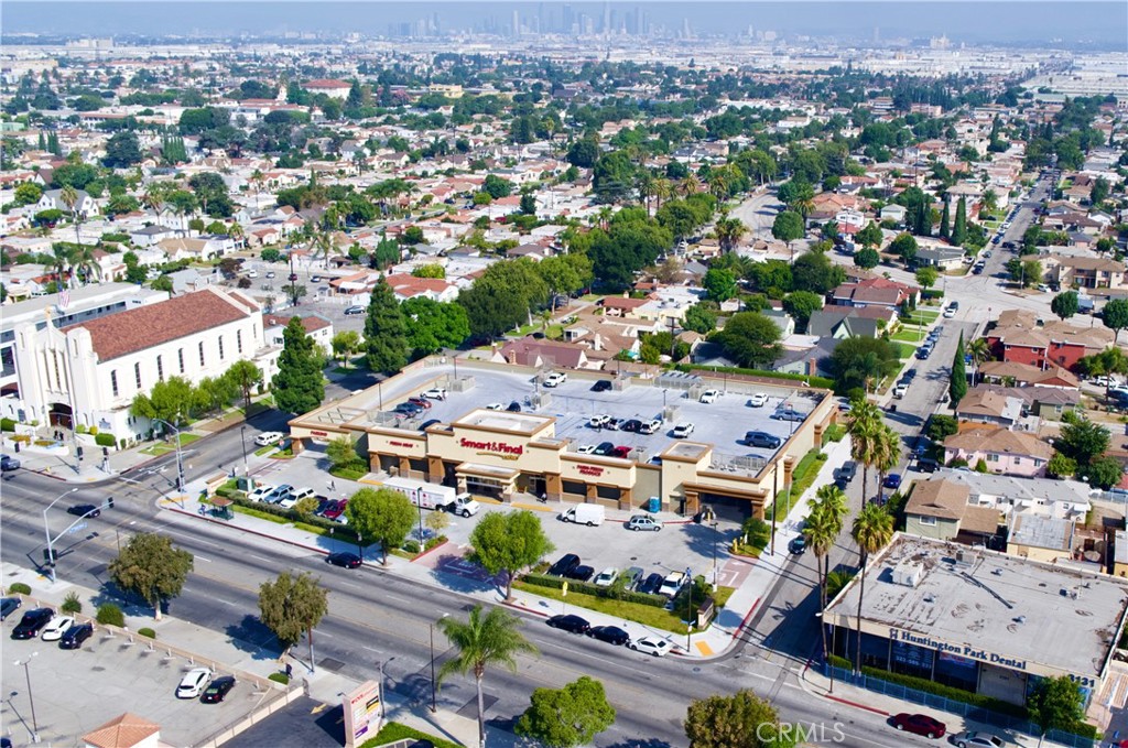 Realty Group Advisors is pleased to present 3111 E Florence Avenue for sale in Huntington Park, California. This freestanding, single-tenant, ±28,000-square-foot retail building sits on a ±1.4-acre lot and is fully leased to Smart & Final, one of the longest operating food retailers in the United States. The property features excellent visibility at the signalized intersection of Florence Avenue and Mission Place, with a combined average daily traffic count of more than 33,000 vehicles. 3111 E Florence Avenue is easily accessible to consumers via I-710 to the east, I-110 to the west, I-105 to the south, and I-10 and I-5 to the north. Additionally, a bus stop along a 38-stop bus route is located directly in front of the building, and Dial-A-Ride taxi services are readily available. This accessibility allows the property to reach the strong surrounding demographics in the Huntington Park area, which is one of the most densely populated markets in Southern California. Within a five-mile radius of the building live more than 1 million residents, who contribute to a consumer spending total of over $7.2 billion. Located just seven miles south of Downtown Los Angeles, the property is situated along a well-established urban street retail district. It draws from the popular surrounding communities of Lynwood, Bell, and Maywood. With its ease of access and strong surrounding demographics, 3111 E Florence Avenue offers an excellent e-commerce-proof investment opportunity in the Gateway Cities district of southeastern Los Angeles County.