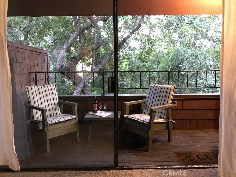 This Beautifully Bright & Airy Home is Located in one of Fullerton's most beautiful settings, the Highly Desired Quail Ridge community. Upon Entering the Home, via the State of the Art Kevo "Touch To Open" Smart Door Lock, you'll be struck by the Vaulted Ceilings, Natural Light & the fresh & contemporary paint colors. The picturesque surroundings are enhanced by Mature Trees, a running stream & waterfalls. Nestled Among these Lush Trees, this Top Floor Condo is located across the street from Craig Park where your family can enjoy year round, outdoor fun! This well cared for home has New Carpeting & Fresh Paint.Two Balconies overlook the Park Like Stream & Lush Landscaping, you'll love the sound of the stream running right below your window!Downstairs Powder Room & Upstairs Full Bath have both been remodeled. The recently updated A/C unit is controlled by a NEST Learning Thermostat.Master Suite with its Cathedral Ceilings & Laundry Area both feature Custom Shelving. Quail Ridge HOA includes a Pool, Spa, Clubhouse, Two Tennis Courts, Exterior Maintenance, including the roof, dues include Water, Trash, Reserved Carport parking very near to the Condo in space 78 & Guest Parking. Conveniently located close to the 57 Fwy, Downtown Brea & Fullerton Shopping, Entertainment, Restaurants, Cal State Fullerton, Western Law, Hope International College & the Fullerton School of Optometry. Ideally Situated, you'll Love Calling this Stunning Property Your New Home!