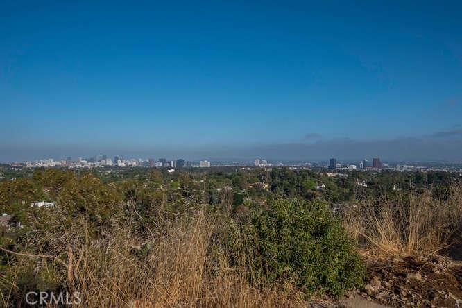 Incredible Opportunity To Create Your Own Private Compound In The Hills of Brentwood!!! 360 Degree Panoramic Views Of The Getty Museum, Palisades & City Lights. Never before on the market!!! Two Separate Very Private Flag-Lot Parcels Being Sold Together; Approximately 3 Acres, Combined. Don't Miss This Fabulous & Extremely Rare Chance To Own These Exceptional Properties!!!