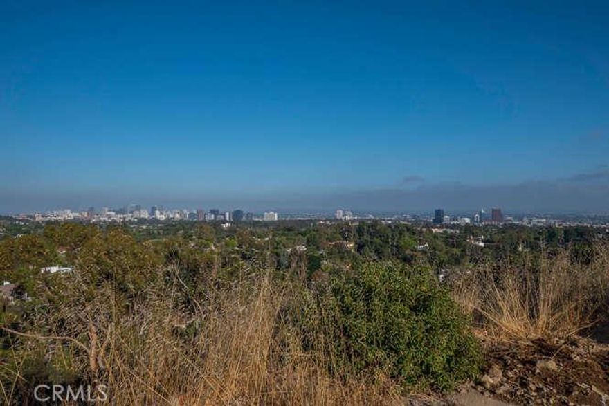 Incredible Opportunity To Create Your Own Private Compound In The Hills of Brentwood!!!  360 Degree Panoramic Views Of The Getty Museum, Palisades & City Lights.  Never before on the market!!!  Two Separate Very Private Flag-Lot Parcels Being Sold Together; Approximately 3 Acres, Combined.  Don't Miss This Fabulous & Extremely Rare Chance To Own These Exceptional Properties!!!