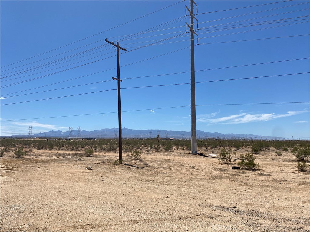 ±25.82 acres of unimproved land for sale fronting Highway 395 in Adelanto, CA; APN: 0459-341-56. Zoned Mixed Use (MU) the site permits for a blend of commercial and multifamily development, allowing 12-18 dwelling units per acre. Sewer & Power at site, water nearby. Lot is flat and usable with more than 600 feet of frontage along the Highway 395. The subject is also located within Adelanto’s Opportunity Zone for potential tax benefits. Local amenities for future residents include Stater Bros Market, Family Dollar, Walgreen’s CVS Drugstore, Starbucks, Bravo Burger, McDonalds, El Montecito Mexican Restaurant, and more. This location has proximity to support the activities of the Southern California Logistics Airport, SCLA has nearly 7 million square feet ft industrial space, with several million additional square feet planned and thousands of jobs being created. SCLA’s current businesses include Amazon, Boeing, GE Aviation, Goodyear, Kuerig Dr. Pepper, M&M/Mars, Newell Rubbermaid, and more. Buyer to verify all information contained herein. Agent and their representatives are not responsible for the accuracy of these claims.