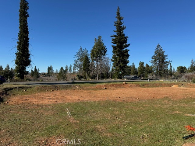 Endless views of the Feather River Canyon with this rare canyon side parcel where the build site is flat, utilities hookup ready and the property boasts a custom in-ground pool that can be returned to the backyard oasis it once was. The parcel goes down into the canyon for extra privacy and a nature watching retreat. Build your own custom home or choose from one of town's approved build plans.
