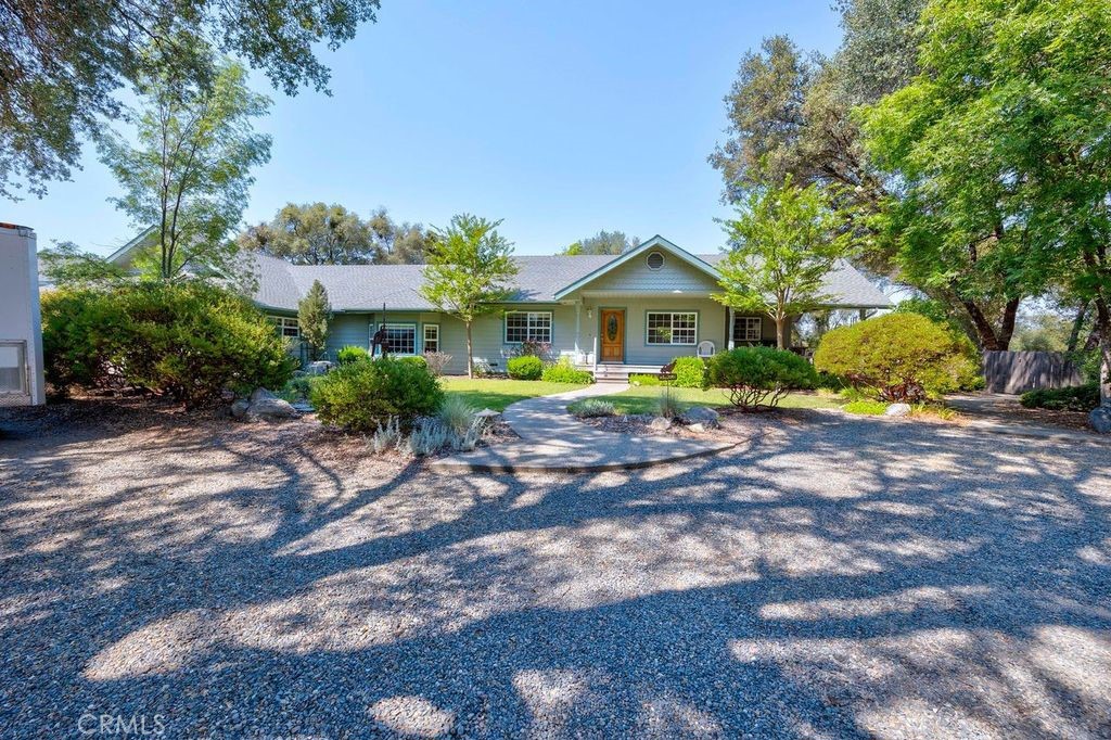 An exceptional opportunity to acquire
almost 3 acres in the mountains of
Mariposa! Featuring a charming 2,600
square foot 3 bedroom 3 bath home,
2,000 square foot shop and 936 square
foot potential ADU! Additionally, there
are 2 storage garages as well as a 2,880
square foot shop & office with a
restroom. Use the shops for your own
contractor business or lease them out.
The possibilities are endless.
Conveniently located on HWY 49 just
east of Darrah Rd in Bootjack.