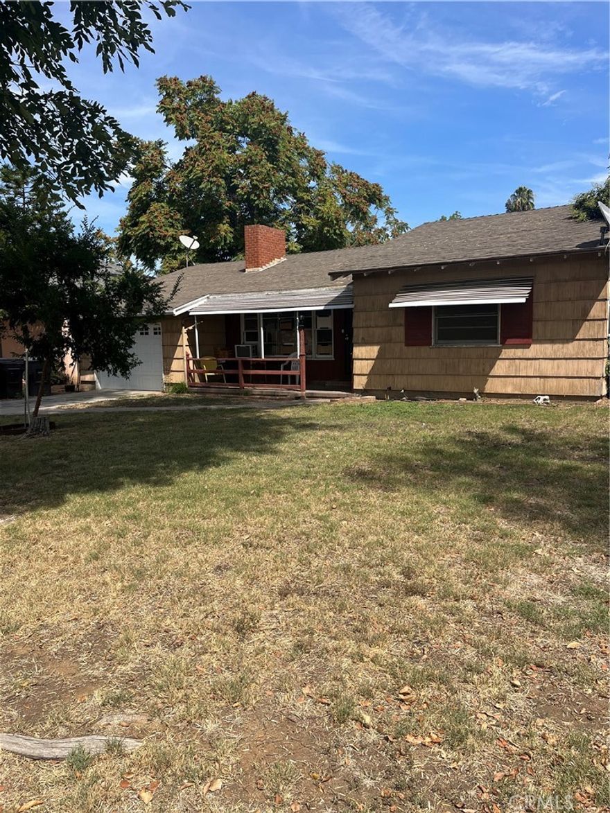 !!!!!!! BEAUTIFUL HOME !!!!!! This neighborhood is beyond adorable, quiet & never made left the 50's with mature tree lines up and down the road. This home is a just shy of 1300 SQFT, 2 Bedrooms and 1 full bath, living room, opened up dining room with a beautiful kitchen, cabinets etc. Inside has been fully painted, wood flooring, updated bathroom and a brand NEW AC System. Beautiful front covered porch and a large 7,851 SQFT lot and usable backyard with two metal sheds. In addition, a brand NEW garage door & motor has been installed. Hurry and bring your family. Call now.