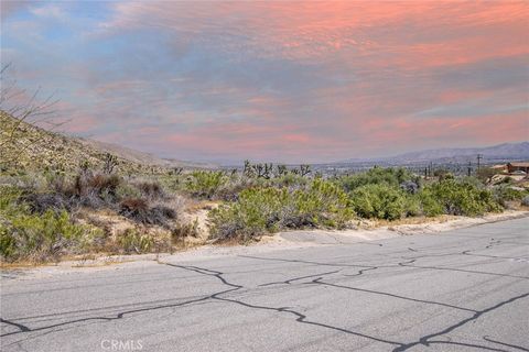 Photo of 54129 Pinon Drive, Yucca Valley, CA 92284 (MLS # JT24207293)