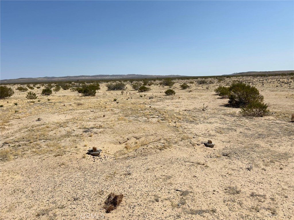 This 10-acre parcel 9APN 0493-181-08-0000) near Helendale, CA, offers breathtaking desert views and a peaceful, secluded atmosphere. It's ideal for building your home or just to have a place for camping if you seeking for tranquility and natural beauty. Enjoy stunning sunrises, starry skies, and the peace of off-grid living just a short drive from town and amenities.