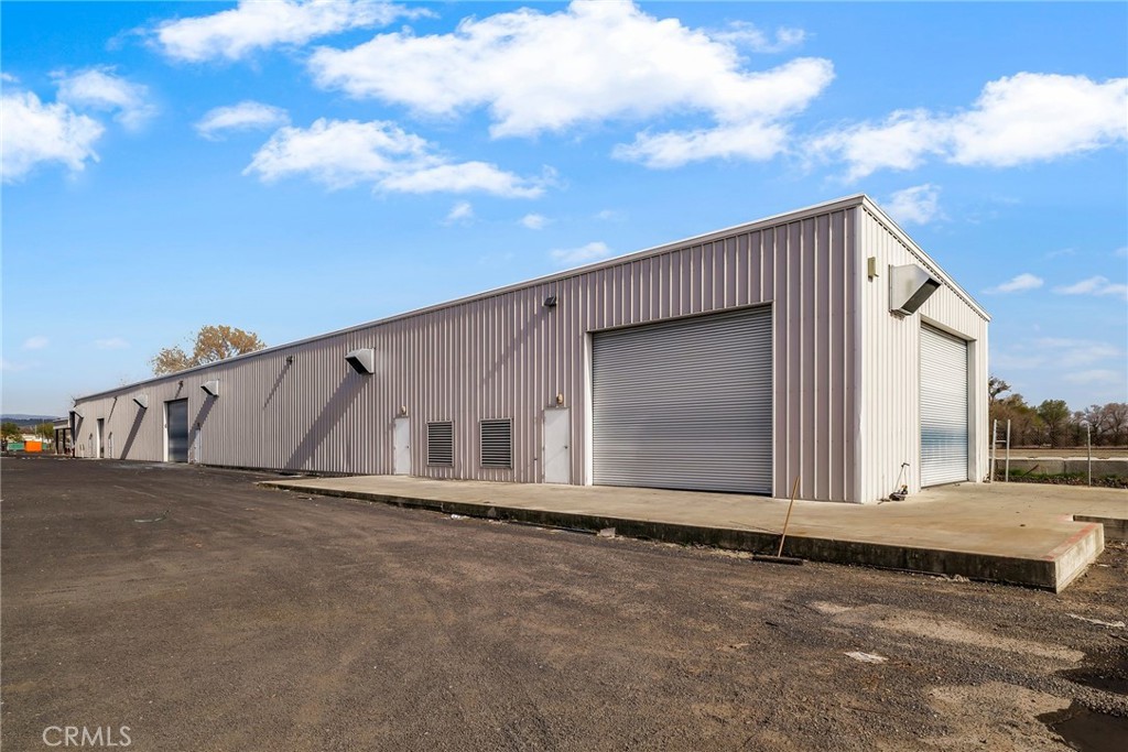 Warehouse building in a great location, right off Hwy 99 with access from a lighted intersection. Warehouse space is approximately 9,240 SQ FT, includes a single office, and is fully insulated with ample ventilation and power. Covered area is approximately 3,000 SQ FT. Property can potentially be expanded with additional paved yard space.