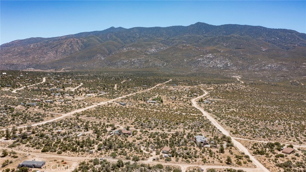Beautiful one acre lot in the quiet Alpine Village, the area of Mountain Center. This lot#1 has panoramic mountain views. Use this land to be creative and build your dream home, horse property or even vacation spot. Amazing views of the Santa Rosa’s and the San Jacinto’s. Close to various hiking trails and it's about 20 mins from downtown Palm Desert that offers great shopping stores, fine dining and much more. The property is located close to the 74 highway