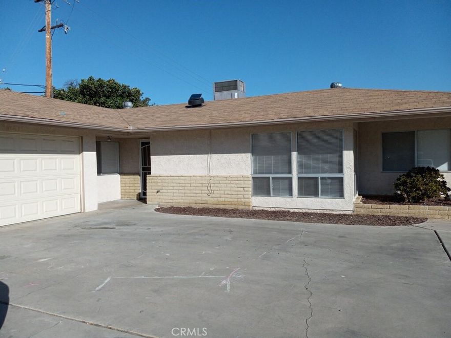 Oh my! All of this! This super clean home is the back unit of a duplex. The two units are separated by private garages. The unit has two bedrooms and a bonus room that could be a guest, play, craft room or office. The house has two bathrooms and inside laundry hookups. Gorgeous floors, tile and carpeting. Private back patio in a quiet setting. Don't wait! No pets please!