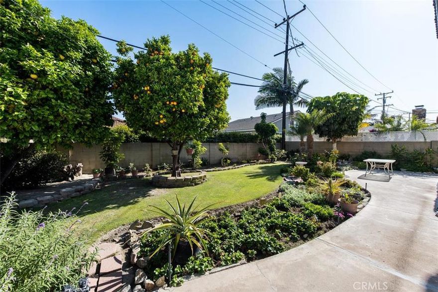 BACK ON MARKET! COME SEE THE NEW FLOORS! If you have seen this house before, come back and take a second look and see the upgrades! Ideally Located where Seal Beach & Huntington Beach Meet Westminster in the highly sought after University Tract (Sol Vista).  Property features lots of space in a phenomenal Orange County neighborhood including TWO living rooms, one formal and one casual with large wood burning fireplace open to the kitchen with access to big backyard via 8' dual pane sliding glass doors. The ground level features one bedroom and a large 1/2 bath with space to add a shower. Stairs lead to an additional 4 bedrooms and 2 full baths. All windows and doors have been replaced with energy efficient dual pane.  Enjoy the Direct Access oversize 2 car garage & cozy front porch. Located on a quiet inner tract street, live here and enjoy walking to Gold Ribbon Award Winning Eastwood Elementary School & Bolsa Chica Park which has mature trees, lighted tennis and basketball courts.