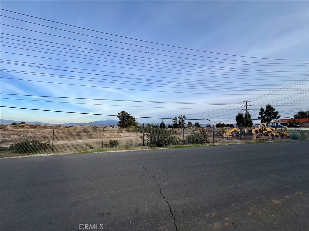 Discover the potential of this exceptional 4.31-acre vacant land, ideally located near the intersection of 4th Street and Navajo Road in the heart of Perris, California. Nestled within a highly desirable community renowned for its charming subdivisions and family-friendly atmosphere, this property offers a rare opportunity for residential development or a variety of other uses.
Zoned R-10,000, this versatile parcel allows for a range of possibilities, making it an ideal investment for developers, builders, or individuals looking to create their dream property. Whether you envision a custom home, or another permitted use, this land provides the space and flexibility to bring your vision to life.
Don’t miss your chance to own this rare and versatile piece of land in one of Perris’ most sought-after locations. Whether you’re planning a development project or securing a long-term investment, this 4.31-acre parcel is ready to meet your needs. Contact us today to explore the endless possibilities this property has to offer!
Please note that the property lines depicted in the photos are approximate and should be verified by the buyer through a professional survey.