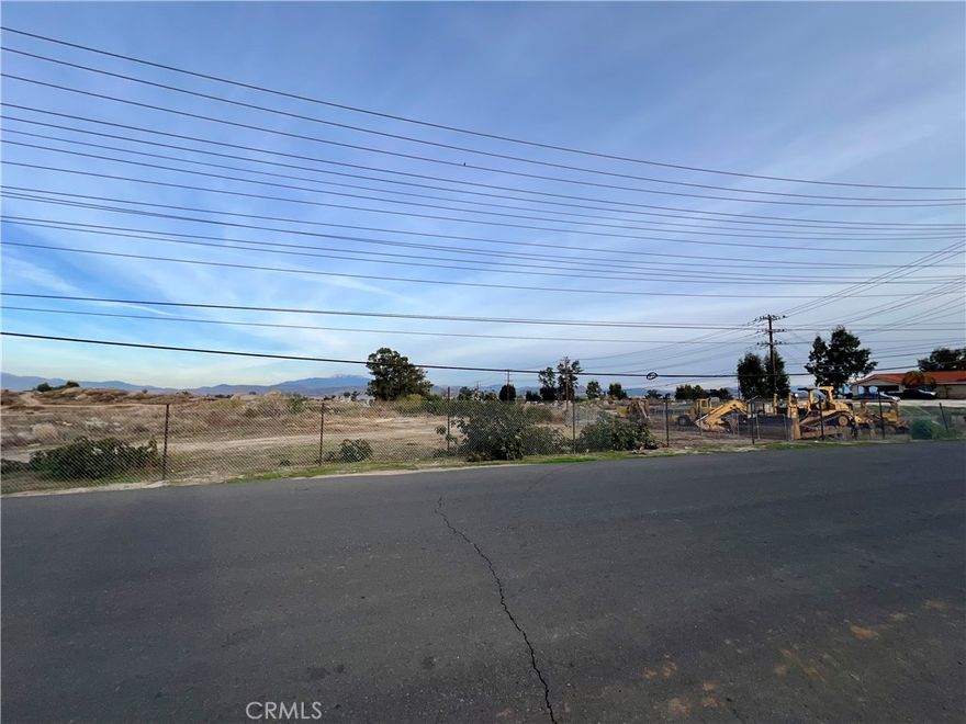 Discover the potential of this exceptional 4.31-acre vacant land, ideally located near the intersection of 4th Street and Navajo Road in the heart of Perris, California. Nestled within a highly desirable community renowned for its charming subdivisions and family-friendly atmosphere, this property offers a rare opportunity for residential development or a variety of other uses.

Zoned R-10,000, this versatile parcel allows for a range of possibilities, making it an ideal investment for developers, builders, or individuals looking to create their dream property. Whether you envision a custom home, or another permitted use, this land provides the space and flexibility to bring your vision to life.

Don’t miss your chance to own this rare and versatile piece of land in one of Perris’ most sought-after locations. Whether you’re planning a development project or securing a long-term investment, this 4.31-acre parcel is ready to meet your needs. Contact us today to explore the endless possibilities this property has to offer!

Please note that the property lines depicted in the photos are approximate and should be verified by the buyer through a professional survey.