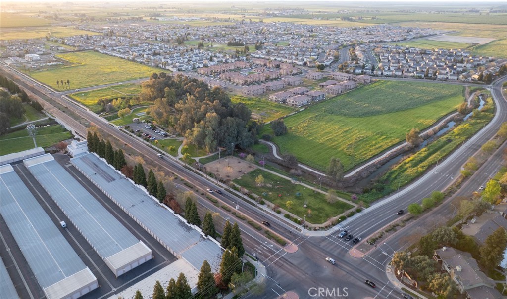 Incredible 10+ acre parcel ready to be turned into housing in the heart of Merced. Zoned R-4 max density residential allowing 20-36 units per acre (buyer to check with City of Merced). Situated just off the corner of Yosemite and R St, you won't find a better location. Easy and convenient access to UC Merced, Merced College, local high schools, elementary schools, grocery stores, cafes, restaurants, and walking paths. Black Rascal Creek runs adjacent to the property providing for a gorgeous serene setting where you can enjoy nature in it's finest. You'll find a neighborhood dog park at the rear of the parcel providing great convenience for your future tenants. Walking paths extend underneath R Street and provide for great access on foot from this parcel. A bus stopped is planned for the front of the parcel along Pacific. The City of Merced continues to experience tremendous growth in both population, economic development, and the expansion of UC Merced. The need for housing is urgent and the City of Merced is very much in favor of the residential development of this property. Contact agent for details.