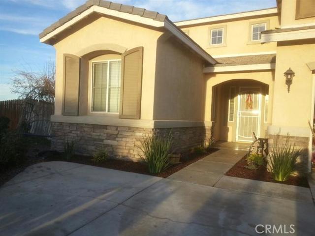 Spacious 5/6 bedrooms, formal dining room, and amazing views! Owner spent over $80,000 in upgrades, including new loft, tile flooring, kitchen with granite counter tops, and tiled guest house. Big master bedroom balcony with beautiful view of Spring Valley Lake and city lights. Best view in all of the High Desert. This house is a must see! Association Amenities: None # of RV Spaces: 0 Special Features: BN,,GH,LF,PTRY,SHNONE Lot Location Type: On Lake Special Features: Garage Door Opener # of Attached Spaces: 2 # of Detached Spaces: 0