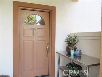 **LOCATION, LOCATION, LOCATION**. Within WALKING DISTANCE is the BACK BAY TRAILS, BALBOA ISLAND!!!! This Remodeled condo boasts granite counter tops, stainless appliances, custom cabinets, new mirrored closet door, new vanity, CUSTOM marble fireplace, Wood floors. Washer and Dyer in the Unit. Back Patio to Relax and Entertain. Air Conditioning. Private 1 car garage and convenient Guest Parking. Gated community with great amenities 2 Pools, 2 Spas and 2 Exercise Gyms! Short drive to Fashion Island where you can Shop, Eat at the Great Restaurants!!