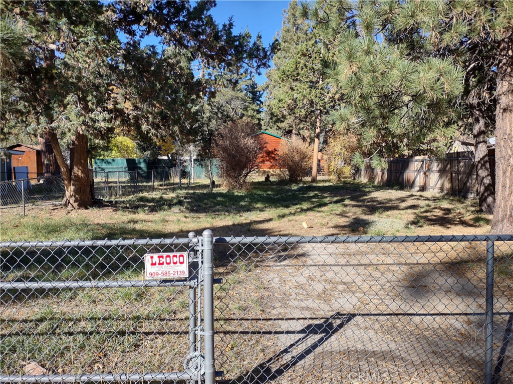 a tranquil escape for you and your loved ones, take a break from the grind. This exquisite parcel in Sugarloaf, just southeast of Big Bear Lake, is your canvas to create cherished memories.
Nestled between neighboring homes on both sides, this flat, ready-to-build lot offers the convenience of public water, sewer, and electricity already connected to the road, making your dream home a reality.
Imagine customizing your future home, inside and out, to reflect your unique style. Once complete, you can invite your friends and family member to to come breathe in the mountain's crisp air, serenaded by the delightful chirping of birds. Morning jogs become rejuvenating amidst this picturesque setting.
For those who seek adventure, the possibilities are endless. Enjoy horseback riding tours at Baldwin Lake Stables, taking in the natural beauty of the area. Experience the ultimate thrill with private helicopter tours of Big Bear, capturing the landscape from a new perspective. In winter, carve the slopes with exhilarating skiing or snowboarding just around the corner.
And let's not forget, you're only a 10-minute drive from the shores of Big Bear Lake, where you can savor water activities and year-round fun. Building a house or bring in a mobile home on this parcel creates endless adventures and serenity.
Don't miss this opportunity to secure your own slice of paradise, just 10 minutes from the shimmering Big Bear Lake. Act swiftly, as this unique parcel won't be available for long.