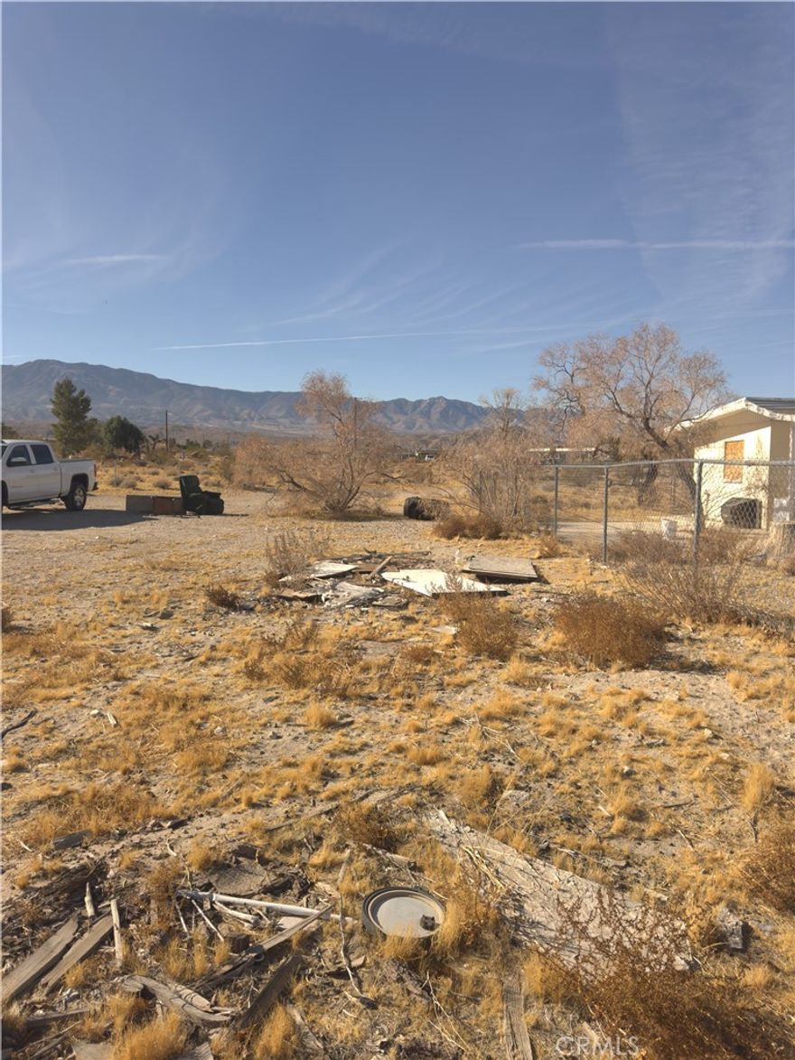 PRICE REDUCTION!! DON'T MISS OUT ON THIS AWESOME OPPORTUNITY TO OWN THIS FIXER UPPER HOUSE in the Heart of peaceful Lucerne Valley!! Just needs some careful TLC and it is already fully fenced and gated with all utilities hooked up water, electric and public water on 1.25 acres in a populated neighborhood of Lucerne Valley!! Make us an offer we can't refuse!!