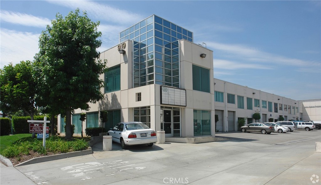 Industrial warehouse with high ceiling and roll up door available featuring one loft-style office, one private office and a kitchenette. Both the office area and warehouse area have central air/heat with excellent condition. Conveniently located with a short drive to So. Pasadena, Monterey Park and Downtown LA. Walking distance to Starbucks, IHOP, Costco, Kolh's, Albertson's and across from LA Fitness.