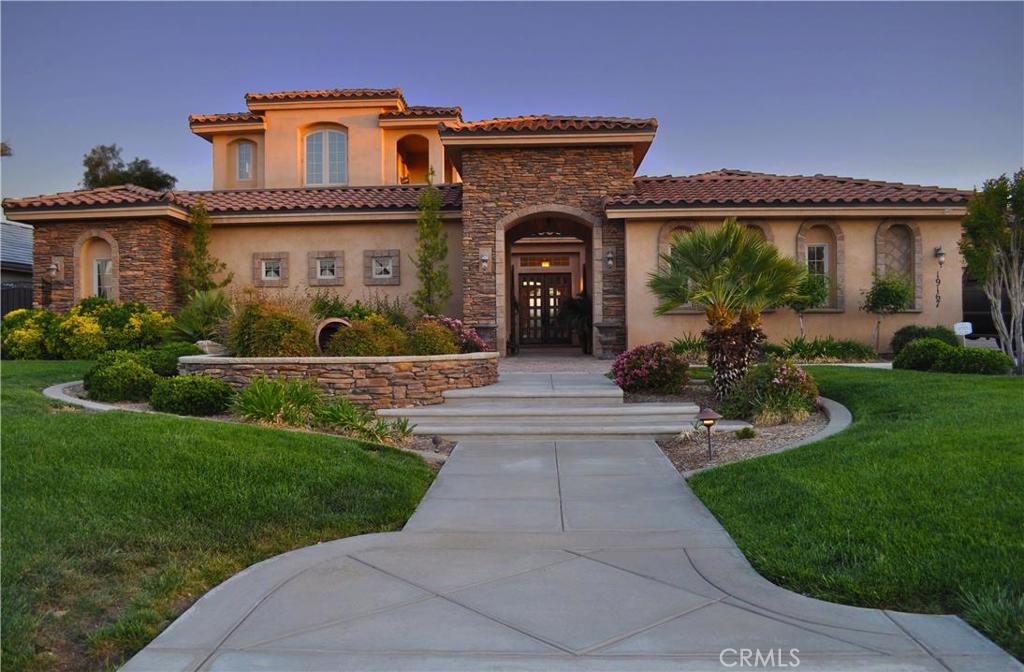 Stonebrook Estates - Apple Valley's finest gated community! This 4,236 sq.ft. custom estate home offers privacy, security and one of a kind Mediterranean style. The home is carefully planned for comfortable family living or elegant entertaining. Standout amenities range from the private 493 sqft gated courtyard entry, 13' ceiling formal dining room, the modern open kitchen - family room floor plan leading to the 496 sq.ft. outdoor living space giving access to a salt water pool/spa, built-in barbecue and the city-lights and mountain views. Master suite has sitting area and luxurious bath with separate vanities. All secondary bedrooms have in-suite baths and walk-in closets. Potential second master suite is located upstairs. Chef kitchen is appointed with stainless steel appliances, pasta cooker, island, granite, double oven and 2 dishwashers. Attention to detail, design and modern amenities make this a home you need to experience.