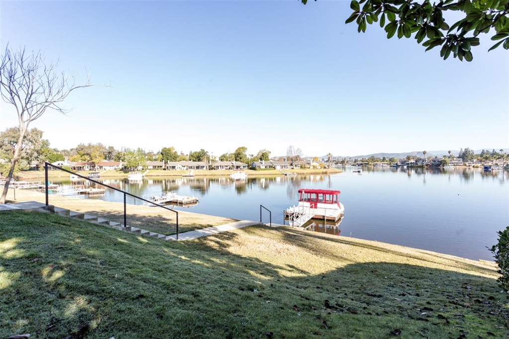 Beautifully remodeled Single Story Lakefront Home. Premier end unit on cul-du-sac. Unobstructed lakefront views. Indoor/outdoor living with access to private patios from both ensuite bedrooms, and the open floor plan living space. Fully finished enclosed atrium/office. You'll appreciate the high quality finishes throughout. Large walk in showers, glass tile, dual vanities, tankless water heater, indoor laundry and lots of storage. *Home may be purchased completely furnished. Ideal for a second home. Neighborhoods: Sunrise Pointe Equipment: Garage Door Opener Other Fees: 0 Sewer: Sewer Connected Topography: LL