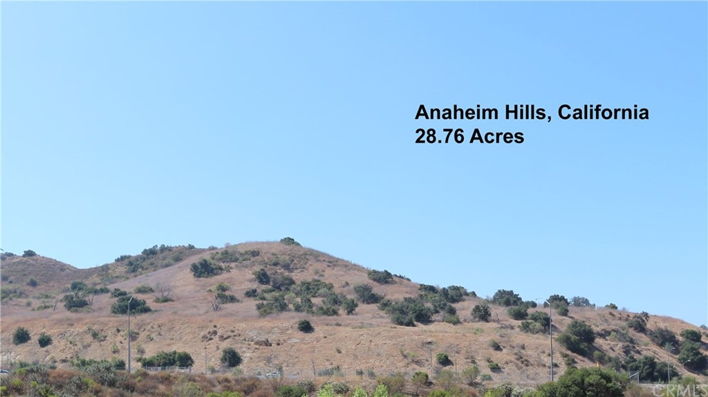 Exceptional 28.76 Acre Combined Parcel Site near Festival Shopping Center in Anaheim Hills. Current zoning is for 1.5 SFR per acre for a max of 43 Single Family Residential Homes or Custom Home Sites. May have potential for Apartments, Condos, Senior or Religious Facilities or Executive Retreat subject to zone change and/or other governmental requirements. Note: Address has not been assigned to the Property, the number 1 is an arbitrary address.