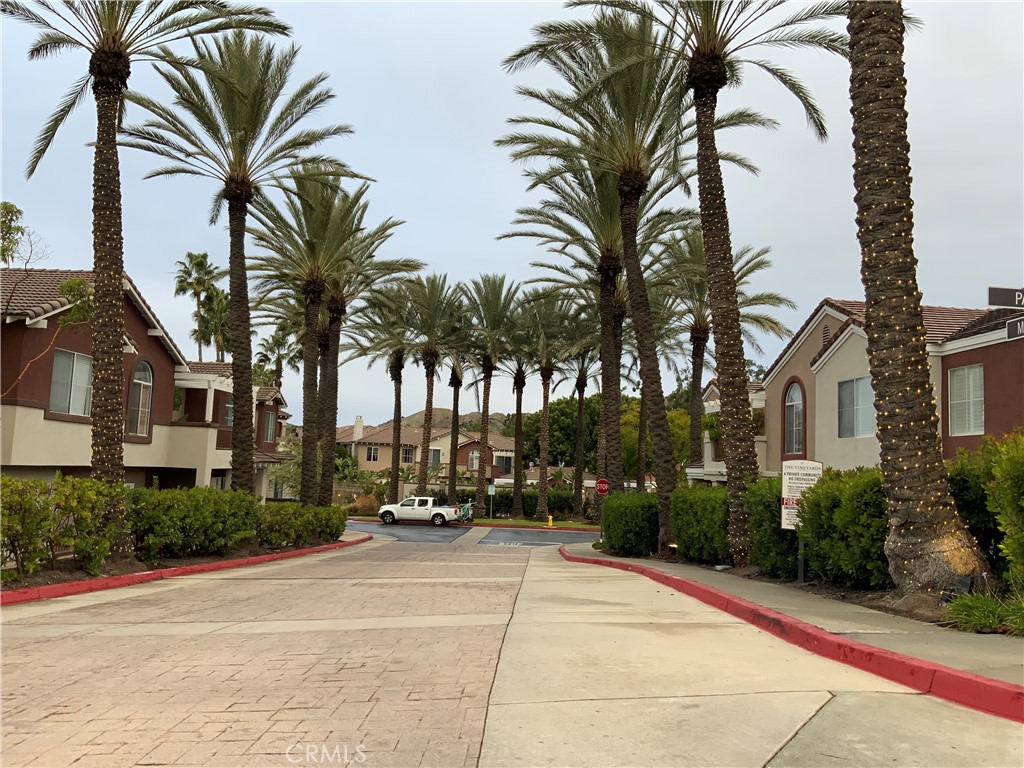 Available for immediate move in. Upgraded 2 bedroom, 2 bath townhome in a private location with a sunset view patio. Open floor plan with living room, dining room, and kitchen configured to create a spacious airy feel. Retire to the private outdoor terrace through sliding glass doors at the living room. Home is upgraded, features laminate flooring, natural light, central air, and a fireplace in the living room. Washer and dryer are provided and located in the single car attached garage for your convenience. Plus you are also assigned 2 more parking spaces! Rent includes washer, dryer and refrigerator.
This home is located in Foothill Ranch with a pool, spa, and tot lot. Shops, restaurants, and movie theaters are all within easy walking distance. Enjoy the close proximity to acclaimed Foothill Ranch Elementary, hiking/biking (Whiting Ranch Wilderness Park), and easy to access to the 241 toll road.