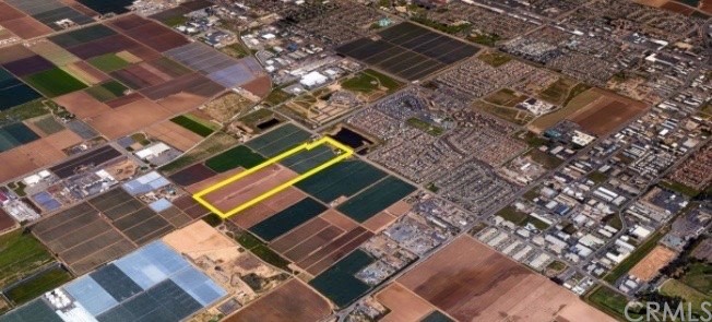 ± 52 acres of commercial land for sale, zoned for professional offices and light industrial purposes. Located on A Street within the Area 9 Specific Plan, the property consists of two legal parcels currently farmed in strawberries, in addition to a single-family residence, shop and garage. Zoned CPO & PD/M-1. Purchase Price: $8,875,000.