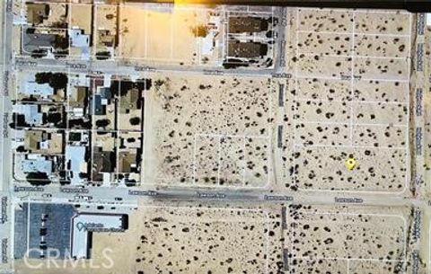 Photo of 0 Hollyhock 74, Adelanto, CA 92301 (MLS # HD24244646)