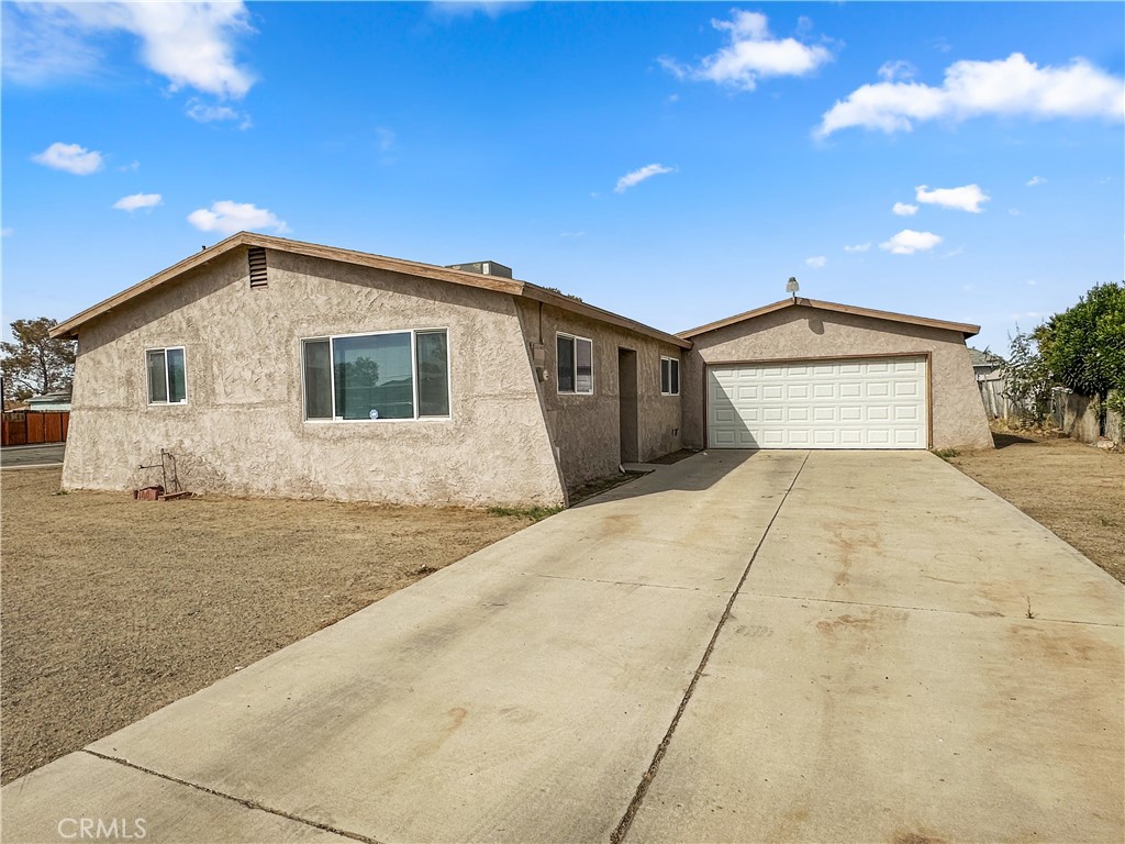 This is the perfect starter home for a first time buyer or a great rental property. This well maintained property offers a spacious and inviting layout, perfect for anyone looking for a comfortale living. The kitchen is upgraded modern style with beautiful counter tops and brown cabinets. All bedrooms are spacious and inviting. The yard has alot of potential to create your own landscape. Located in a quiet neighboorhood and close to major highways. This home is offers so much, you must see in person!