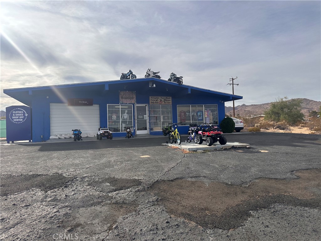 Prime Commercial Opportunity on High-Traffic Highway in 29 Palms
Strategically located on the main highway leading into 29 Palms, this commercial property offers exceptional visibility and exposure. Situated in the highly sought-after Indian Cove area, the property presents versatile possibilities for various business ventures. Currently utilized as a retail space, the building features ample storage, office areas, two bathrooms, and a garage.
The expansive, fully fenced rear yard adds to the functionality of the property. Additionally, the owner holds three adjacent parcels (APNs: 0614-092-03-0000, 0614-092-02-0000, and 0614-092-01-0000), each measuring .22 acres. These parcels may be included in the sale, opening the door to even more opportunities. Don't miss out on this exceptional location and its potential for growth and development.