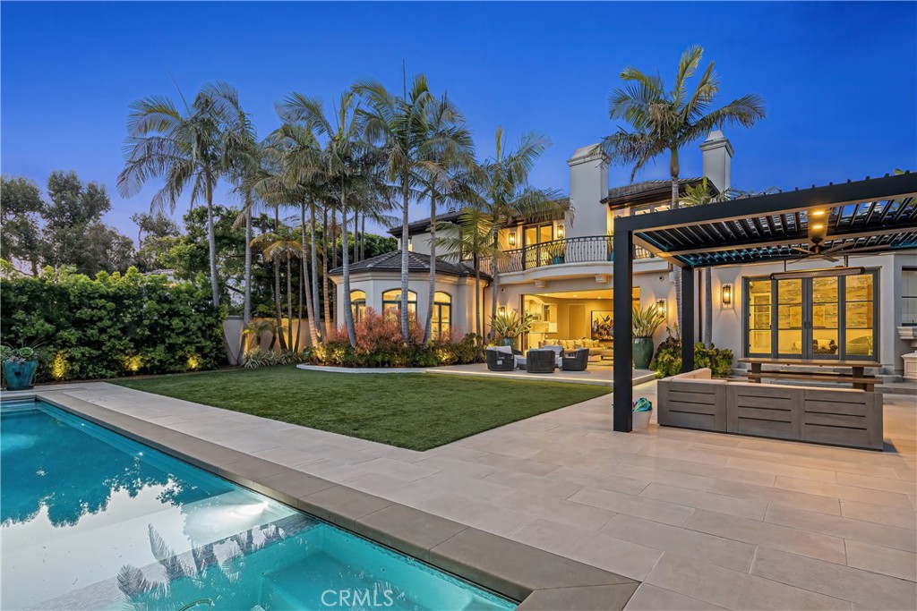 Rarely does an opportunity come available to own a home on this highly sought after private road in East Manhattan Beach. This sprawling estate offers over 10,000 square feet of lavish living space, including 7 bedrooms and 7.5 bathrooms, set on a premier 15,000 square foot lot. Step into grandeur through the majestic foyer, featuring an imperial staircase that sets the tone for comfortable elegance. The home is exquisitely designed with a careful balance of form and function that make this oasis RARE. Step outside and be greeted by the equally impressive exterior of the property, boasting lush landscaping and mature trees that offer both privacy and seclusion. Whether you're entertaining guests or seeking a quiet retreat, the seamless indoor/outdoor living spaces provide the perfect setting. The primary retreat is incredibly spacious with lavish amenities including a spa-like bath, walk-in closet with separate walk-in shoe closet and dressing room. Other notable highlights include an executive home office, sports bar with entertaining room, in-home theater, fitness studio, wine cellar speakeasy, convenient gift wrapping/storage room, dual-sided garages, sparkling pool and spa, outdoor shower, outdoor firepit & BBQ area. This is the epitome of luxury living in Manhattan Beach and minutes to everything this incredible beach town has to offer!
