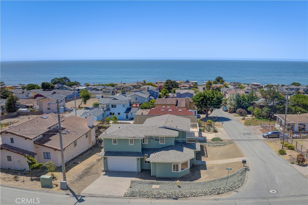 Welcome to your new and JUST BUILT dream coastal retreat in the highly sought-after Marine Terrace neighborhood of Cambria, CA! This rare, brand new construction home, completed in 2024, offers the perfect blend of luxury and serene coastal living. Spanning 2,039 square feet plus a 2 car garage, this exquisite 4-bedroom, 2.5-bathroom residence is thoughtfully designed to capture stunning ocean views from multiple vantage points. The spacious, light-filled living areas feature an open-concept layout, seamlessly connecting the gourmet kitchen, dining, and living rooms—perfect for both entertaining and relaxation. The master suite is a true sanctuary, offering ocean views, a luxurious en-suite bathroom, and ample closet space. Three additional bedrooms provide comfort and privacy for family or guests, with access to their own elegantly appointed bathroom. Situated on a 5,161 square foot corner lot, the property offers plenty of outdoor space to enjoy the coastal breeze, whether it's from the living room, dining area, bedrooms or the expansive decks. Just a short stroll to the beach and the iconic Fiscalini Ranch Preserve, this home is ideal for those seeking a tranquil yet vibrant lifestyle. Don’t miss this rare opportunity to own a brand new home in one of Cambria’s most desirable neighborhoods. This is more than just a home; it's a lifestyle. Call your realtor today!