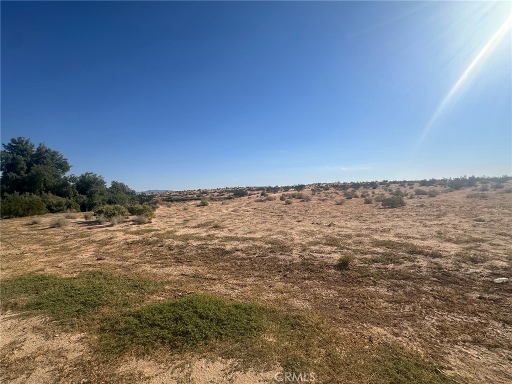 Perfect investment opportunity, located close to 29 Palms Military base, across from Smith's Ranch Drive In, next to Spirit & Truth Worship Center. With almost 5 acres of commercial land, the possibilities are unlimited.