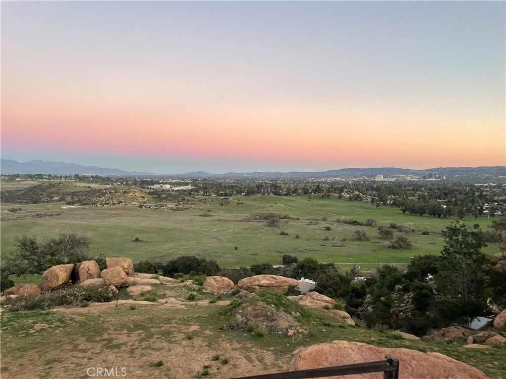 NEW PRICE!!!
It is your time to seize an exceptional opportunity to craft your dream property on a truly extraordinary piece of land! These unique parcels, elevated above the San Fernando Valley, offer unparalleled panoramic views that capture the natural beauty of the Chatsworth Animal Preserve, the serene reservoir, the vibrant Warner Center, and the mesmerizing valley lights that twinkle at night.
These remarkable parcels are beautifully situated among striking rock formations and neighboring homes, enhancing its picturesque setting. Four separate parcels, bundled together at a single, attractive price. Each parcel has been thoroughly surveyed, with essential utilities like sewer and electricity already in place, ensuring a smooth development process.
These properties provide a rare and exciting canvas for you to bring your vision to life. Conveniently situated close to great shopping, restaurants, award-winning schools, and easy access to the 118 and Topanga Canyon. Whether you’re planning a private retreat, a family estate, or a bespoke residential project, this land offers the ideal foundation for your creative aspirations. Don’t miss this chance to make your dream a reality in one of the most sought-after locations!