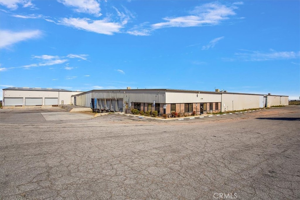 Discover a prime investment in Hesperia, CA, at 8787 Caliente Road: a remarkable industrial facility with 150,000 sq ft of versatile space, plus an extra ±6 acres for development,total of 12AC land. Located just 1/2-mile from Interstate 15 and visible from the freeway, it offers unmatched access for logistics and shipping. This strategic spot is ideal for enhancing logistics and distribution in Southern California, with the upcoming Barstow International Gateway promising to elevate regional connectivity and business prospects. Hesperia stands as a beacon of opportunity, renowned for its thriving community, robust economic development, and strategic location that bridges major cities with natural attractions. Investing here means capitalizing on a business-friendly environment, bolstered by local initiatives and the transformative Barstow to Las Vegas project. It's more than an investment opportunity; it's your chance to be part of a city on the rise, offering a blend of growth, connectivity, and quality of life. Don't miss out on this chance to make a significant impact. The space, location, and potential to realize your ambitions await. Buyer and Buyer Agent to verify all information.