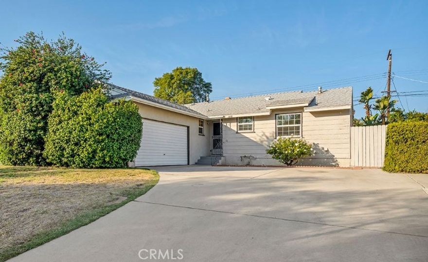 Welcome to this beautifully updated 3-bedroom, 2-bathroom home, nestled on a spacious lot in a charming North Hills neighborhood. Step inside to discover brand-new wood vinyl flooring and fresh paint throughout, creating a bright and inviting atmosphere. The updated kitchen features stunning Quartz countertops, a custom tiled backsplash, a new sink, a modern faucet and dishwasher, perfect for culinary enthusiasts. Relax in the cozy living room with a fireplace, or step through the sliding doors to the expansive backyard, complete with a covered patio ideal for entertaining or unwinding in your private yard. The home offers three generously sized bedrooms and two bathrooms, blending comfort and style. Nice sized laundry room with washer and dryer hookups. With a two-car garage and a prime location, this property is a must-see. Don't miss your opportunity to lease this beautifully upgraded home in a fantastic neighborhood!