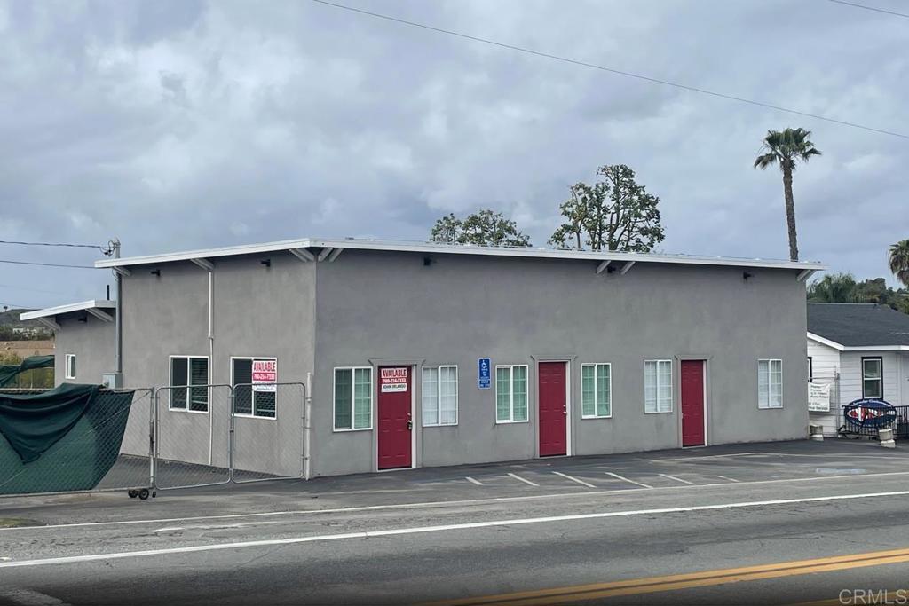 Hard corner of Sycamore/Robellini and South Santa Fe Ave: very high traffic corner with great visibility. Signalized intersection. Huge 10,000sf rear parking lot area which can be used for a large number of uses in the County of San Diego C-36 commercial zoning code. Office building recently renovated and in excellent condition. Lease rate does not include utilities, property expenses or building services Fully Built-Out as Professional Services Office Highly Desirable End Cap Space Space is in Excellent Condition Central Air Conditioning Partitioned Offices Private Restrooms Corner Space Raised Floor High Ceilings Recessed Lighting After Hours HVAC Available Finished Ceilings: 9' Yard Hard corner at traffic signalized intersection