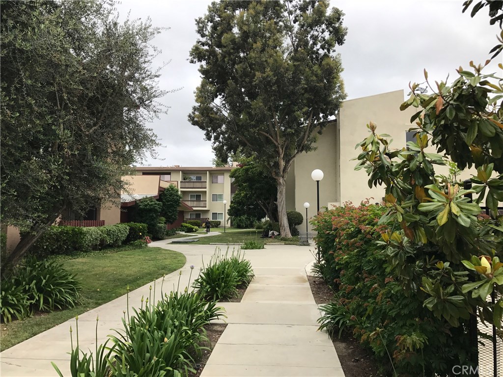 BEST LOCATION IN COMPLEX!! This spacious 3 Bedroom and 2 Bath condo is located in the "Garden Section" of the complex. It is steps away from one of the pools and the community laundry facility. This home has had one owner and has been cared for lovingly. The large open floor plan has a living room that overlooks a private patio. The windows have been replaced and are double pane, professionally painted thru out, tiled bathrooms, custom window coverings. The kitchen has dishwasher, cook top that are less then a year old. Conveniently located a short walking distance to
the Carport #66. Rossmoor Park is a gated community and features two pools, spa, work out gym, recreation room, Gas Barbecue, car wash area, and an on-site manager. Located in the desireable Rossmoor neighborhood and adjacent to the Shops of Rossmoor. Walk to restaurants, shopping,and Financial Institutes. Easy access to Los Angeles and Orange Counties via the 405, 22, 605 Freeways. Bicycle to the Beach and many local parks. Walking distance to Award Winning Los Alamitos Elementary Schools and part of the highly acclaimed.award winning, Los Alamitos Unified School District.
