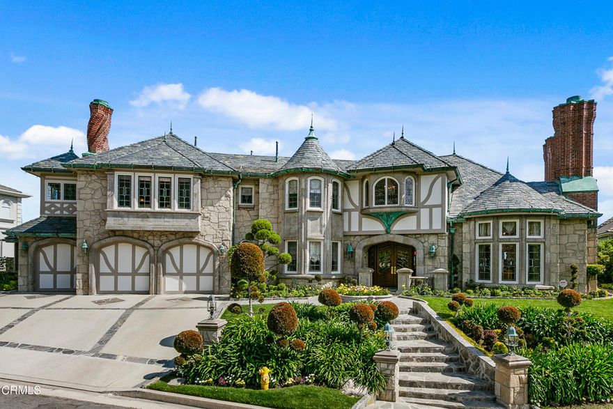 . Magnificent custom-built tutor castle offers one of the highly coveted La Canada Flintridge views, featuring an exquisite panoramic backdrop of picturesque mountain vistas and Los Angeles sky line. Unparalleled quality and craftsmanship, this unique architectural design  Located at the Country Club Greenridge Estates one of the most expensive cul-de-sacs in La Canada Flintridge, with panoramic views. A country French Estate with timeless quality and workmanship.
