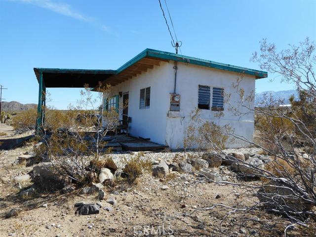 SMALL RECREATION CABIN ON 5 ACRES,PANORAMIC VIEWS OF VALLEY FROM THIS LOCATION.CABIN HAS LIVING AREA,ONE BEDROOM, BATHROOM,KITCHEN,OPEN BEAM CEILING.HAS BEEN NEGLECTED FOR MANY YEARS.NEEDS LOTS OF FIX/UP....SOLD AS IS...HAS 1,000 GALLON WATER TANK, FOR HAULED WATER. THE NEIGHBOR WILL DELIVER 1000 GALLONS FOR $50.00 Association Amenities: None # of RV Spaces: 0 Special Features: BCNONE Frontage Type: Dirt Road Lot Location Type: Standard Location Landscaping: Natural Spa Features: Hauled # of Attached Spaces: 0 # of Detached Spaces: 0 Construction Materials: Masonry