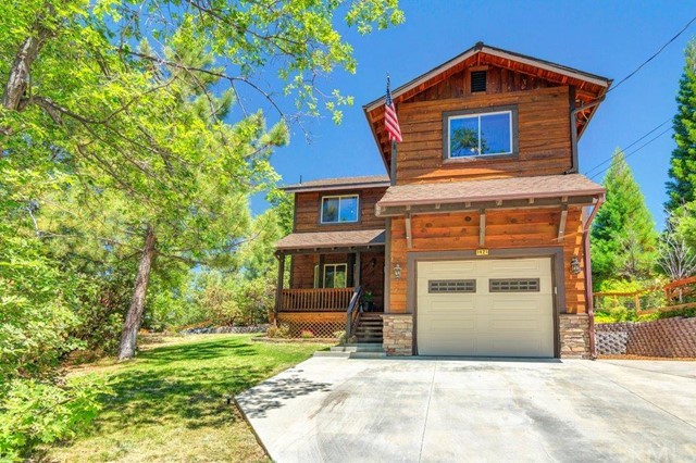 Immaculate! Quality built home with all the upgrades in Deer Lodge Park! 3 bedrooms, 2.5 baths owner built home has been perfectly maintained and is move in ready. Master suite with private deck overlooking untouched forest. Natural wood grains provide a mountain lodge feel throughout the home. A rare level backyard setting for relaxing. Conveniently located close to national forest trails perfect for hikers and off road enthusiast. Price also includes additional parcel of land, this property is a definite gem of its price range!